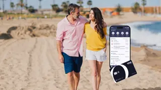 Couple walking on a sandy beach